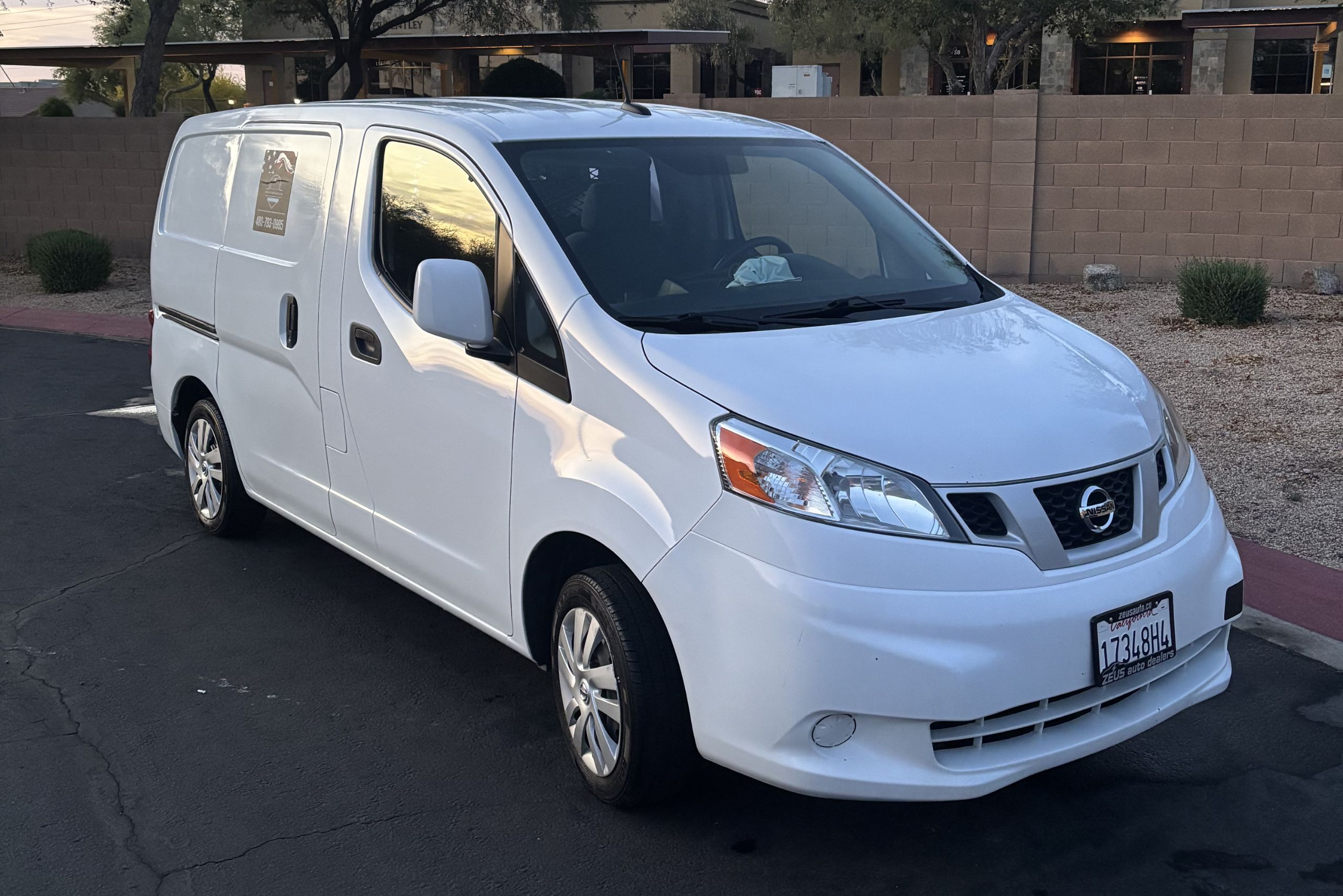 Patriot Auto Detailing work van — front view